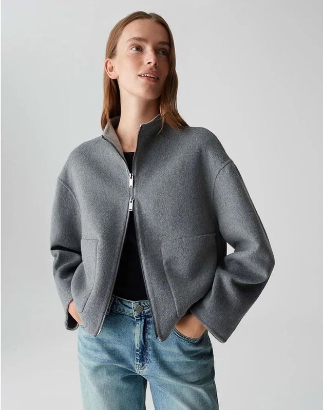 Korte donkergrijze vest met wol