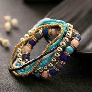 Vrouwen vier seizoenen Boheemse meerlaagse Beaded elastische armband (licht blauw)