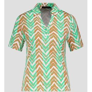 Witte polo met oranje-groene print