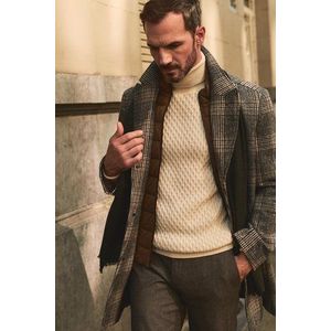 Ecru gebreide trui met rolkraag