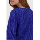 Blauw kleedje met gerafelde textuur