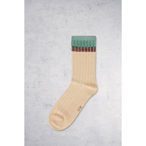 Beige sokken met groen glitterend detail