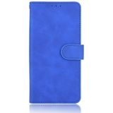 For Motorola Moto E(2020) Solid Color Skin Feel Magnetic Buckle Horizontal Flip Calf Texture PU Leather Case with Holder & Card Slots & Wallet(Blue)