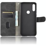 For Motorola Moto E(2020) Solid Color Skin Feel Magnetic Buckle Horizontal Flip Calf Texture PU Leather Case with Holder & Card Slots & Wallet(Black)