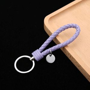 100 PCS Woven Leather Cord Keychain Car Pendant Leather Key Ring Baotou With Small Round Piece(Light Purple)
