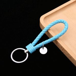 100 PCS Woven Leather Cord Keychain Car Pendant Leather Key Ring Baotou With Small Round Piece(Light Blue)