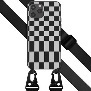 Selencia Siliconen design hoesje met afneembaar koord voor de iPhone 12 (Pro) - Irregular Check Black
