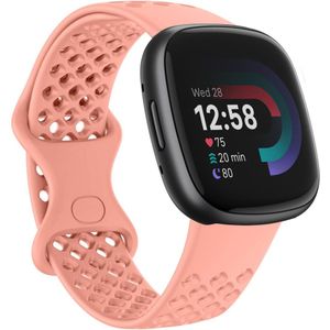 Strap-it Fitbit Versa 4 siliconen bandje met gaatjes (koraal)