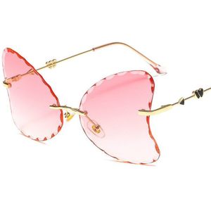 Mode Eenvoudige Mannen En Vrouwen Frameloze Trimmen Zonnebril Golvend Big Frame Vlinder Vormige Metalen Zonnebril Vrouwelijke UV400