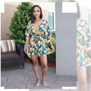 Vrouwen Tie Taille Bloemen Gedrukt Plunge V-hals Romper Korte Mouw Chic Bohemian Stijl Speelpakjes