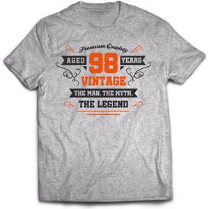 98 Jaar Legend - Feest kado T-Shirt Heren / Dames - Antraciet Grijs / Oranje - Perfect Verjaardag Cadeau Shirt - grappige Spreuken, Zinnen en Teksten. Maat S