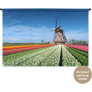Wandkleed Landschappen Nederland - Molen tussen de tulpen in Nederland Wandkleed katoen 180x120 cm - Wandtapijt met foto XXL / Groot formaat!