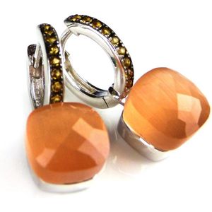 Zilveren oorringen oorbellen model pomellato gezet met oranje steen