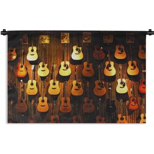 Wandkleed Akoestische gitaar - Veel akoestische gitaren hangen aan een muur Wandkleed katoen 90x60 cm - Wandtapijt met foto