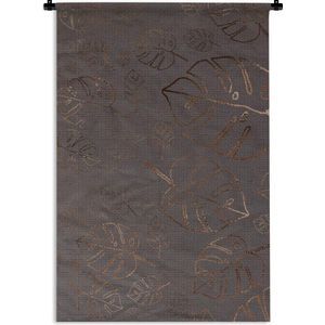 Wandkleed Luxe patroon - Luxe patroon van bronzen bladeren tegen een bruine achtergrond Wandkleed katoen 90x135 cm - Wandtapijt met foto