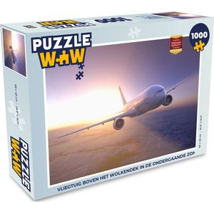 Puzzel Vliegtuig boven het wolkendek in de ondergaande zon - Legpuzzel - Puzzel 1000 stukjes volwassenen