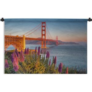 Wandkleed Golden Gate Bridge - Uitzicht op de Golden Gate Bridge met roze bloemen Wandkleed katoen 180x120 cm - Wandtapijt met foto XXL / Groot formaat!
