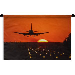 Wandkleed Vliegtuigen - Silhouet van een vliegtuig voor ondergaande zon Wandkleed katoen 180x120 cm - Wandtapijt met foto XXL / Groot formaat!