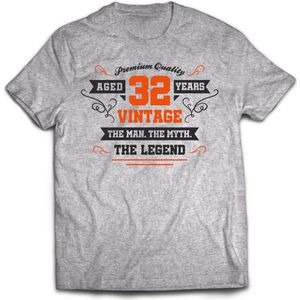 32 Jaar Legend - Feest kado T-Shirt Heren / Dames - Antraciet Grijs / Oranje - Perfect Verjaardag Cadeau Shirt - grappige Spreuken, Zinnen en Teksten. Maat M