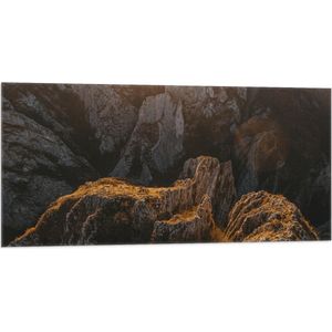 WallClassics - Vlag - Punten van Rots - 100x50 cm Foto op Polyester Vlag