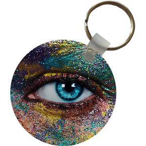 Sleutelhanger - Vrouw met blauw oog en gekleurde poeder - Plastic - Rond - Uitdeelcadeautjes