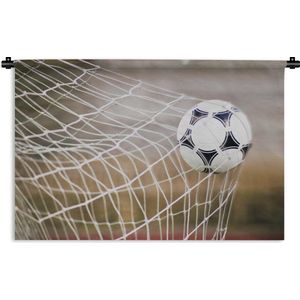 Wandkleed Voetbal - Bal in het net Wandkleed katoen 90x60 cm - Wandtapijt met foto