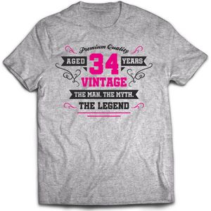 34 Jaar Legend - Feest kado T-Shirt Heren / Dames - Antraciet Grijs / Roze - Perfect Verjaardag Cadeau Shirt - grappige Spreuken, Zinnen en Teksten. Maat S