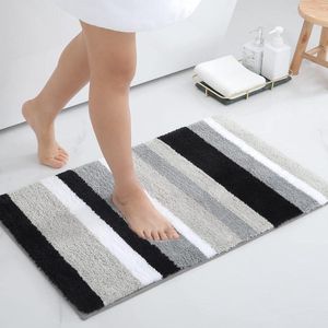 Zacht hoogpolig microvezel badmat absorberend wasbaar 40 x 60 cm zwart/grijs met antislip