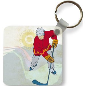 Sleutelhanger - Een illustratie van een man met een rode jas die ijshockey speelt - Plastic - Rond - Uitdeelcadeautjes