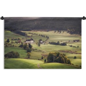 Wandkleed Zwarte Woud - Panoramisch uitzicht over een dorpje bij het Zwarte Woud in Duitsland Wandkleed katoen 150x100 cm - Wandtapijt met foto