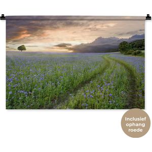 Wandkleed Bloemenvelden - Blauwe en paarse bloemen zonsondergang Wandkleed katoen 90x60 cm - Wandtapijt met foto
