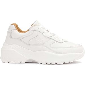 White leather sneakers on a thick sole