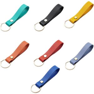 Titel: Set van 7 elegante leren sleutelhangers met ringen voor autosleutels