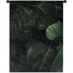 Wandkleed Diep in de jungle - Close-up van regendruppels op grote bladeren Wandkleed katoen 90x120 cm - Wandtapijt met foto