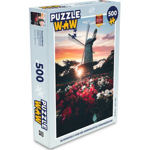 Puzzel Bloemenveld voor een windmolen bij zonsondergang - Legpuzzel - Puzzel 500 stukjes