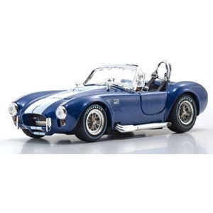 The 1:43 Diecast Modelcar of the Shelby Cobra 427/SC Spider of 1965 in Blue and White. The manufacturer of the scalemodel is Kyosho.This model is only online available.