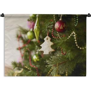 Wandkleed Kerst - Een close-up van een versierde kerstboom Wandkleed katoen 180x135 cm - Wandtapijt met foto