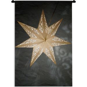 Wandkleed Kerst - Een verlichtte ster tijdens de winter Wandkleed katoen 60x90 cm - Wandtapijt met foto