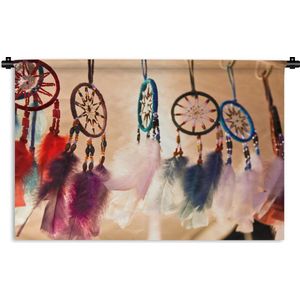 Wandkleed Dromenvanger - De kleurrijke dromenvangers hangen in de wind Wandkleed katoen 120x80 cm - Wandtapijt met foto