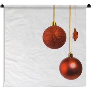 Wandkleed Kerst - Een paar rode kerstballen met een rode kerstster Wandkleed katoen 90x90 cm - Wandtapijt met foto