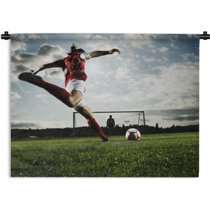 Wandkleed Voetbal - Vrouw schiet op doel Wandkleed katoen 120x90 cm - Wandtapijt met foto