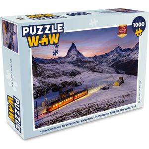 Puzzel Trein door het besneeuwde landschap in Zwitserland bij zonsopkomst - Legpuzzel - Puzzel 1000 stukjes volwassenen
