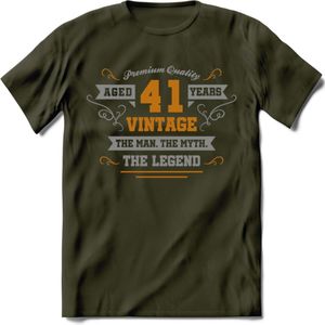 41 Jaar Legend T-Shirt | Goud - Zilver | Grappig Verjaardag Cadeau | Dames - Heren | - Leger Groen - L