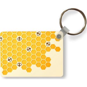 Sleutelhanger - Een illustratie van de binnenkant van een bijenkorf - Uitdeelcadeautjes - Plastic