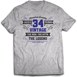 34 Jaar Legend - Feest kado T-Shirt Heren / Dames - Antraciet Grijs / Donker Blauw - Perfect Verjaardag Cadeau Shirt - grappige Spreuken, Zinnen en Teksten. Maat XXL