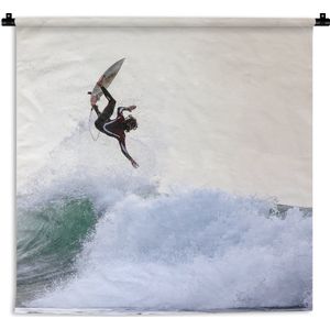 Wandkleed Surfen - Surfer doet een trucje Wandkleed katoen 150x150 cm - Wandtapijt met foto