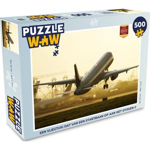 Puzzel Een vliegtuig dat van een startbaan op aan het stijgen is - Legpuzzel - Puzzel 500 stukjes