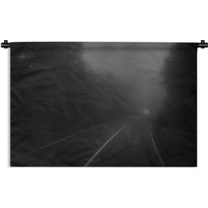 Wandkleed Mistig bos - Koplampen van een auto schijnen door een mistig bos Wandkleed katoen 150x100 cm - Wandtapijt met foto