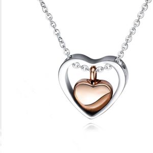 Dutch Duvall | Ashanger RVS zilver & rosé goud kleurig hart| inclusief ketting en vulsetje| Hartvorm as voor urn / sieraad|
