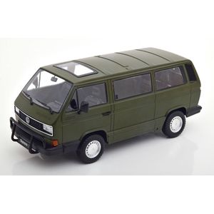 De 1:18 Diecast modelauto van de Volkswagen T3 Bus Syncro van 1987 in Olive Green. De fabrikant van het schaalmodel is KK Scale.This model is alleen online beschikbaar.